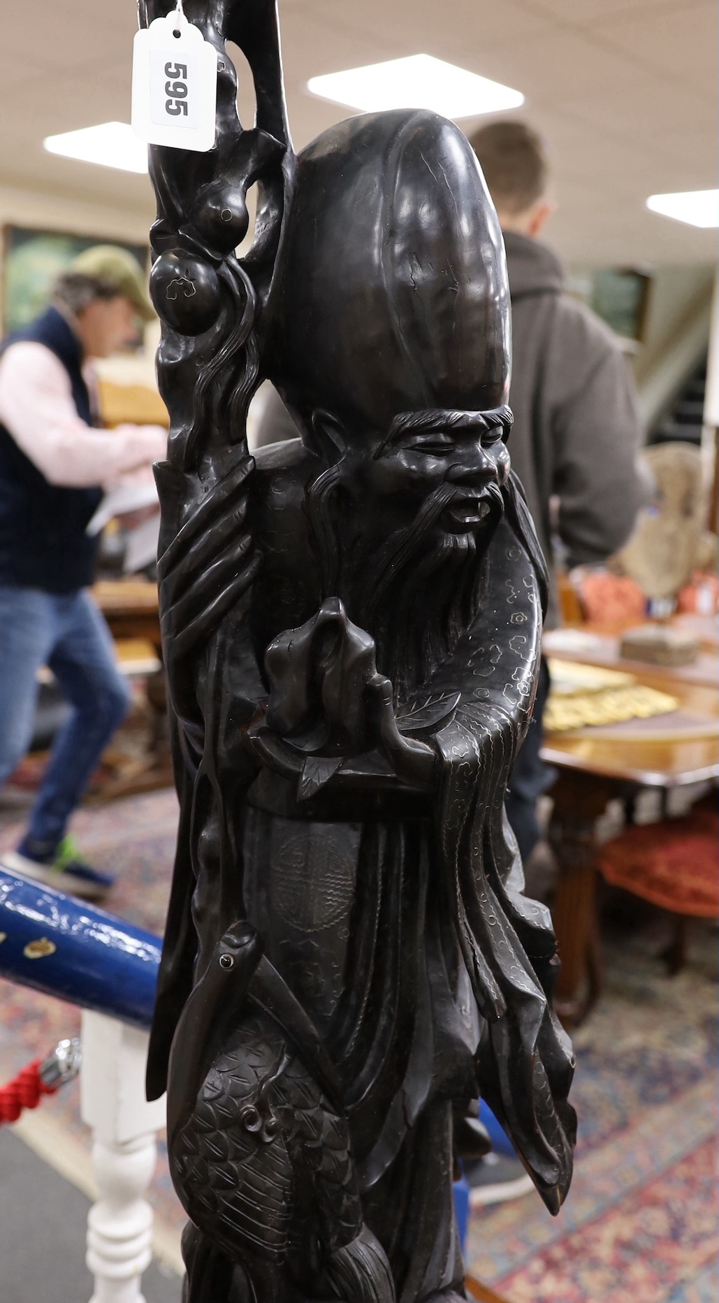 A large Chinese hardwood figure of Shou Lao, first half 20th century, 82cm tall